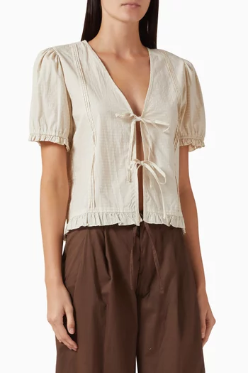 بلوزة بطيّات محاكة قطن عضوي