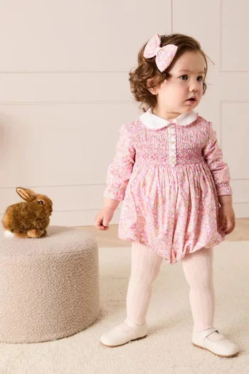 رومبر نيلي بنقشة زهور وكشكش يدوي