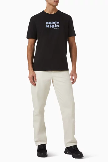 تي شيرت بطبعة شعار الماركة مستوحى من الثلاثينيات قطن جيرسيه