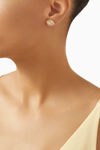 أقراط بتصميم عين رع مرصعة بالماس ذهب وردي عيار 18