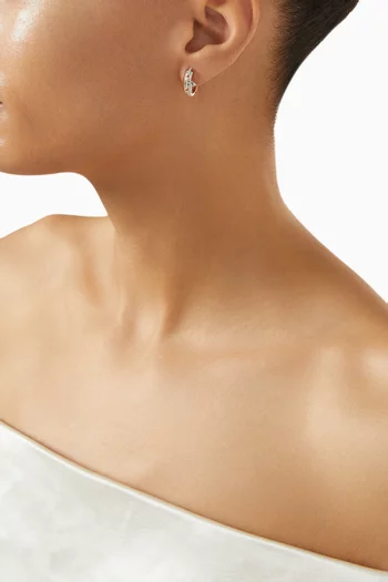 أقراط هاجي أزتيك مرصعة بالماس ذهب وردي عيار 18