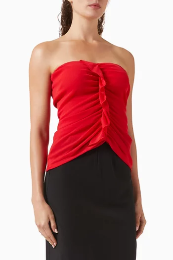 بلوزة بفتحة رقبة بلا حمالات وكشكش رقيق