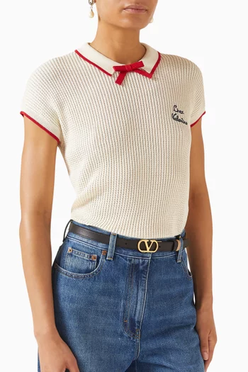 حزام بوجهين وإبزيم بشعار الماركة الشهير جلد