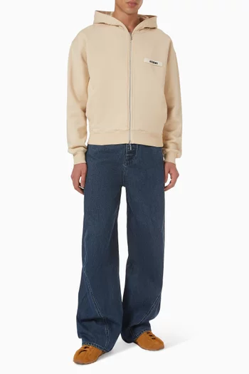 كنزة بغطاء رأس وسحّاب بشريط مضلع بشعار الماركة قطن عضوي