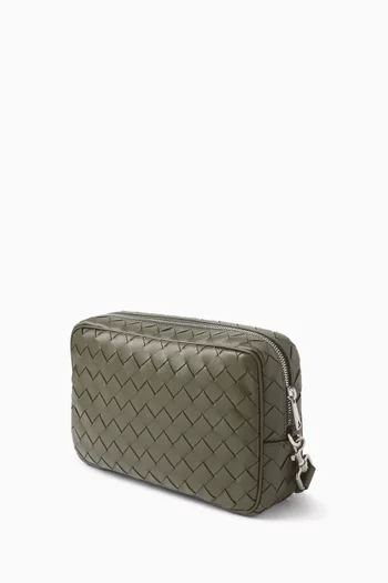 حقيبة صغيرة بحمالة معصم جلد مجدول