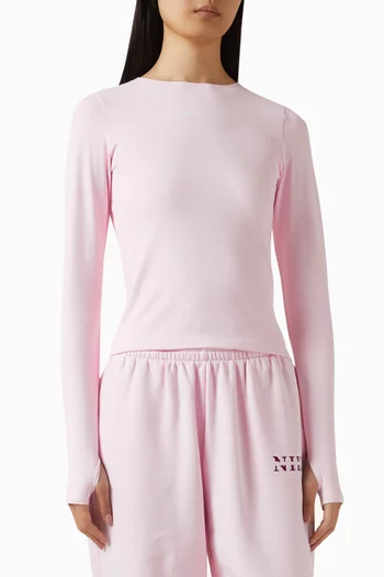 بلوزة بقصة ضيقة وتقنية Dri-FIT‏