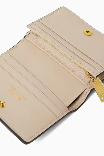 محفظة ثنائية الطي بشارة الماركة جلد