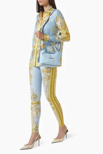 حقيبة هوبو بشارة جلد نابا