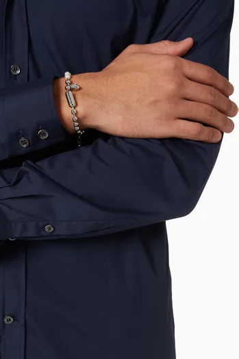 سوار بلؤلؤ وحلية جمجمة نحاس