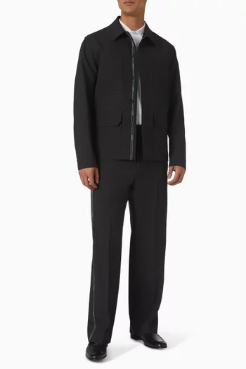 جاكيت صوف بأشرطة مضلعة