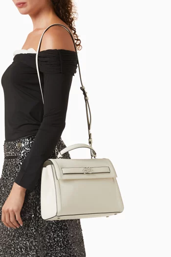 حقيبة كيه/اوتوغراف متوسطة بيد علوية جلد