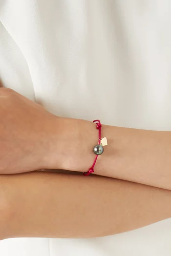 سوار بتصميم حبل مزين بحلية قلب ولؤلؤ ذهب أصفر عيار 18