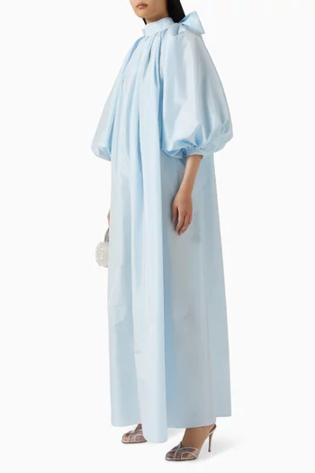 فستان كريما طويل بأكمام منفوخة