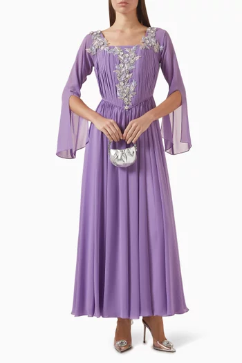 فستان طويل بتصميم مشد بطيّات