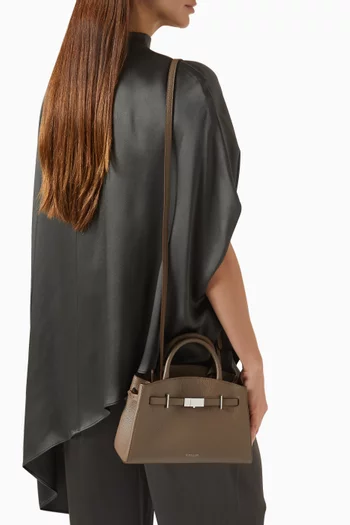 حقيبة هادسون صغيرة بيد علوية جلد بارز الملمس