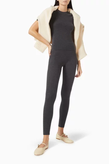 بلوزة منسوجة بفتحة رقبة مستديرة