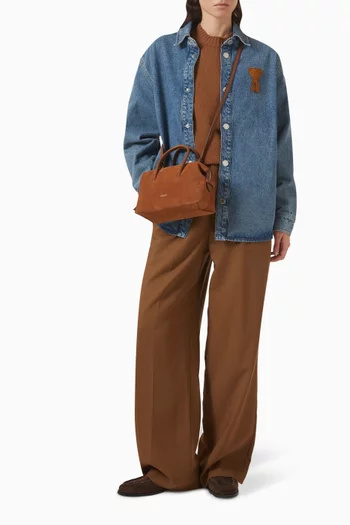 قميص منسوج بشعار الماركة دينم