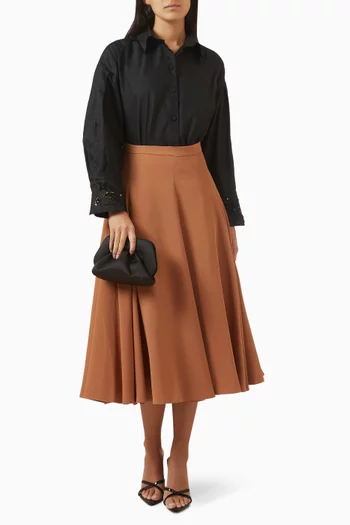 قميص بقصة فضفاضة