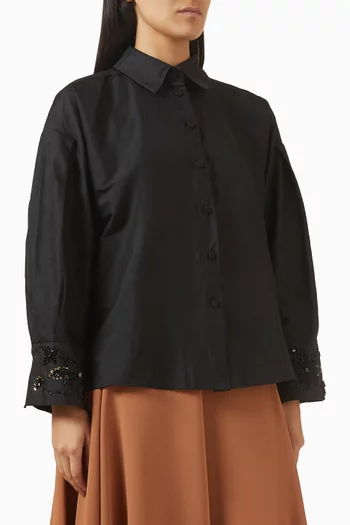 قميص بقصة فضفاضة