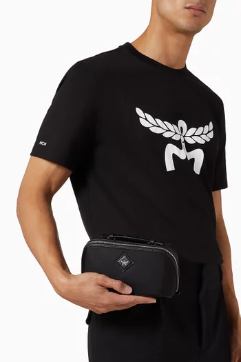 Ottomar Toiletry Bag in ECONYL® & Leather