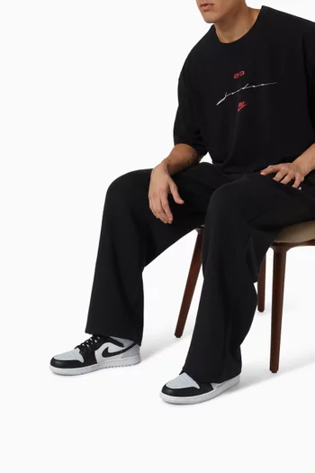 Air Jordan 1 Mid Sneakers in Leather