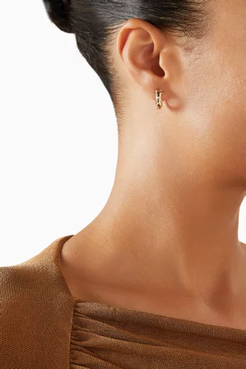 أقراط باف أوف بلوميتيس دائرية ذهب أصفر عيار 9