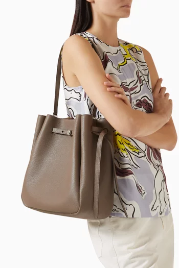 حقيبة باكيت رومي كبيرة جلد بارز الملمس