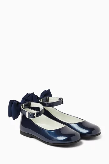 حذاء باليرينا مزين بعقدة وكعب مسطح جلد لامع
