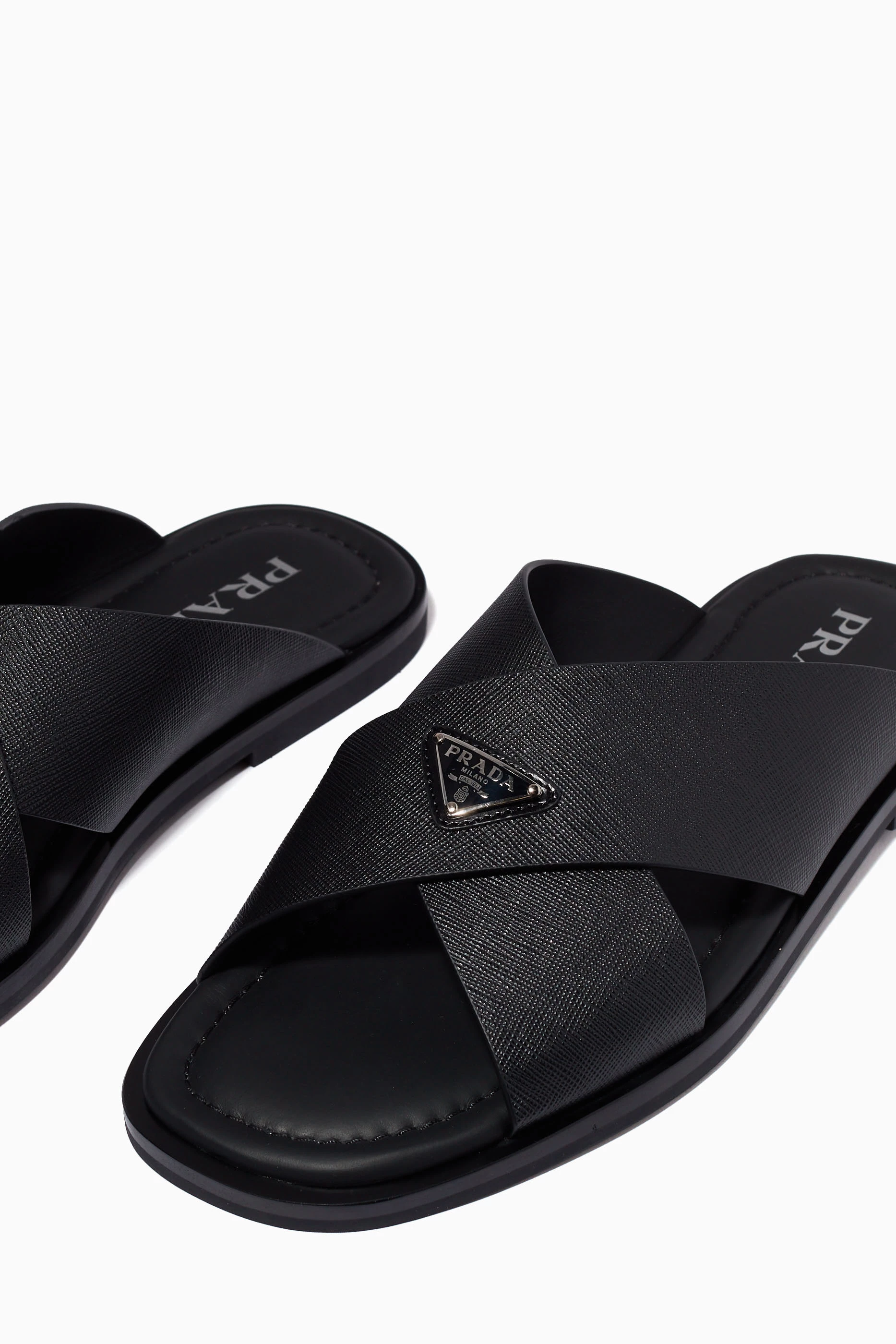Buy Prada Black Triangle Logo Crisscross Sandals in Saffiano  display picture 1