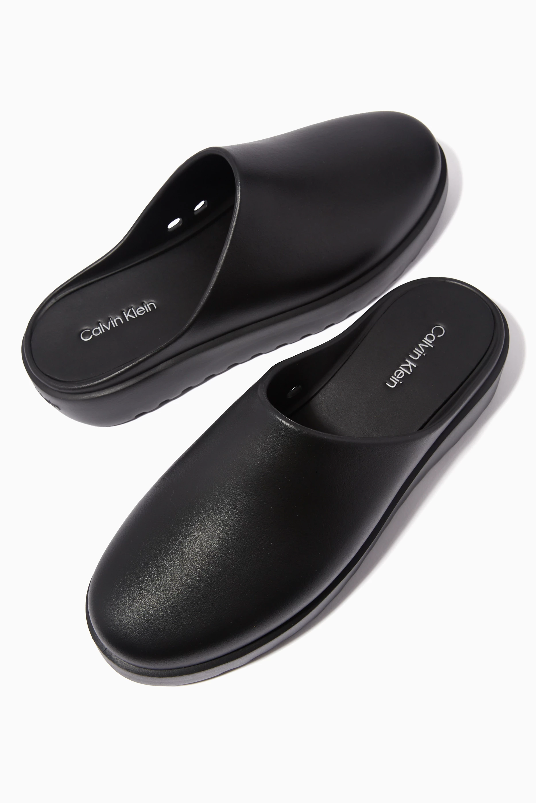Buy Calvin Klein Black Mule Slippers in EVA For Men Online Ounass Oman