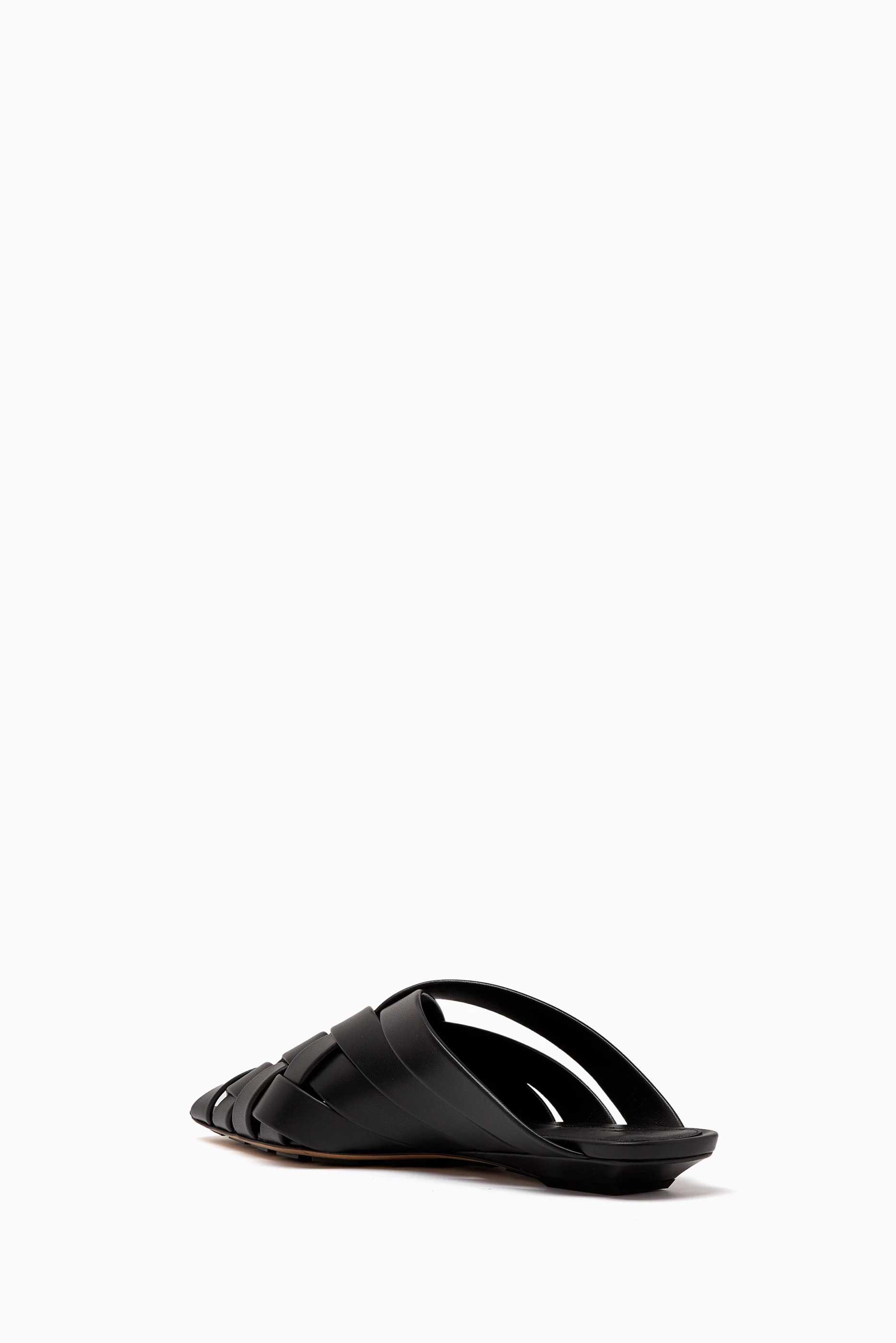 Buy Bottega Veneta Black Alfie Flat Mules in Intreccio Leather For 