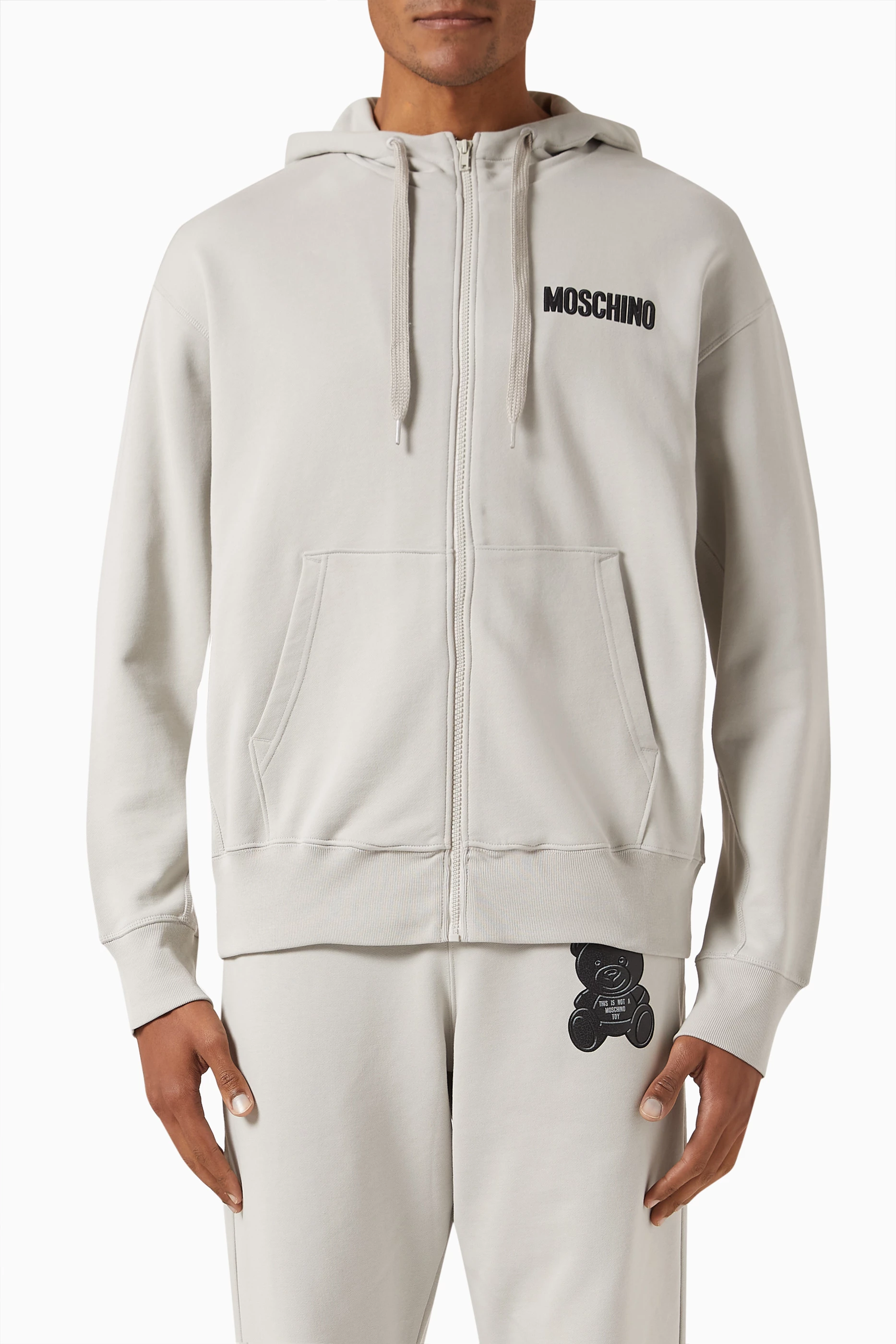 Buy Moschino Grey Graphic Logo Print Hoodie in Cotton Fleece Online for Men Ounass Oman