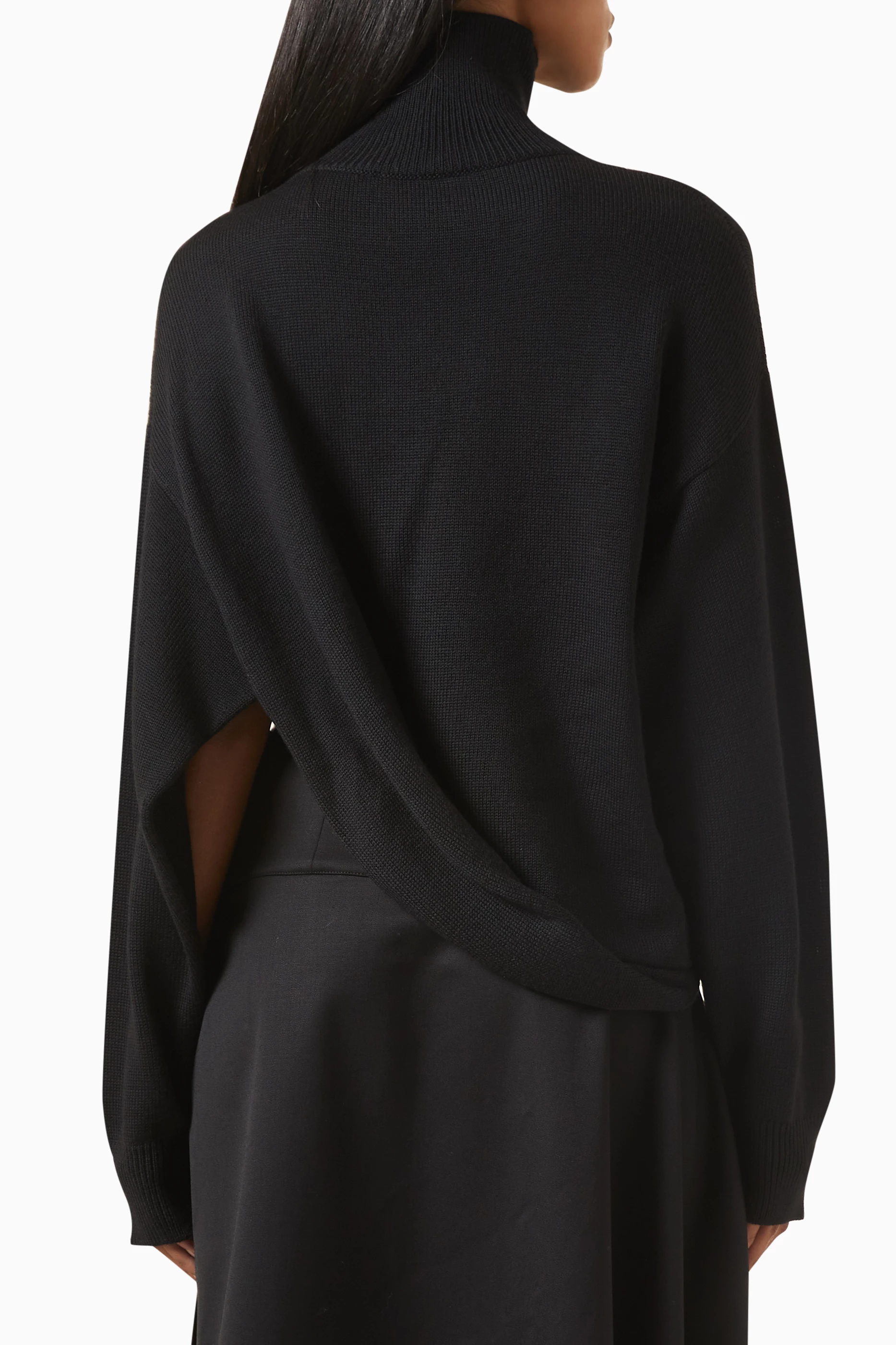 Buy Alaïa Black Asymmetrical Knit Sweater in Wool For Women