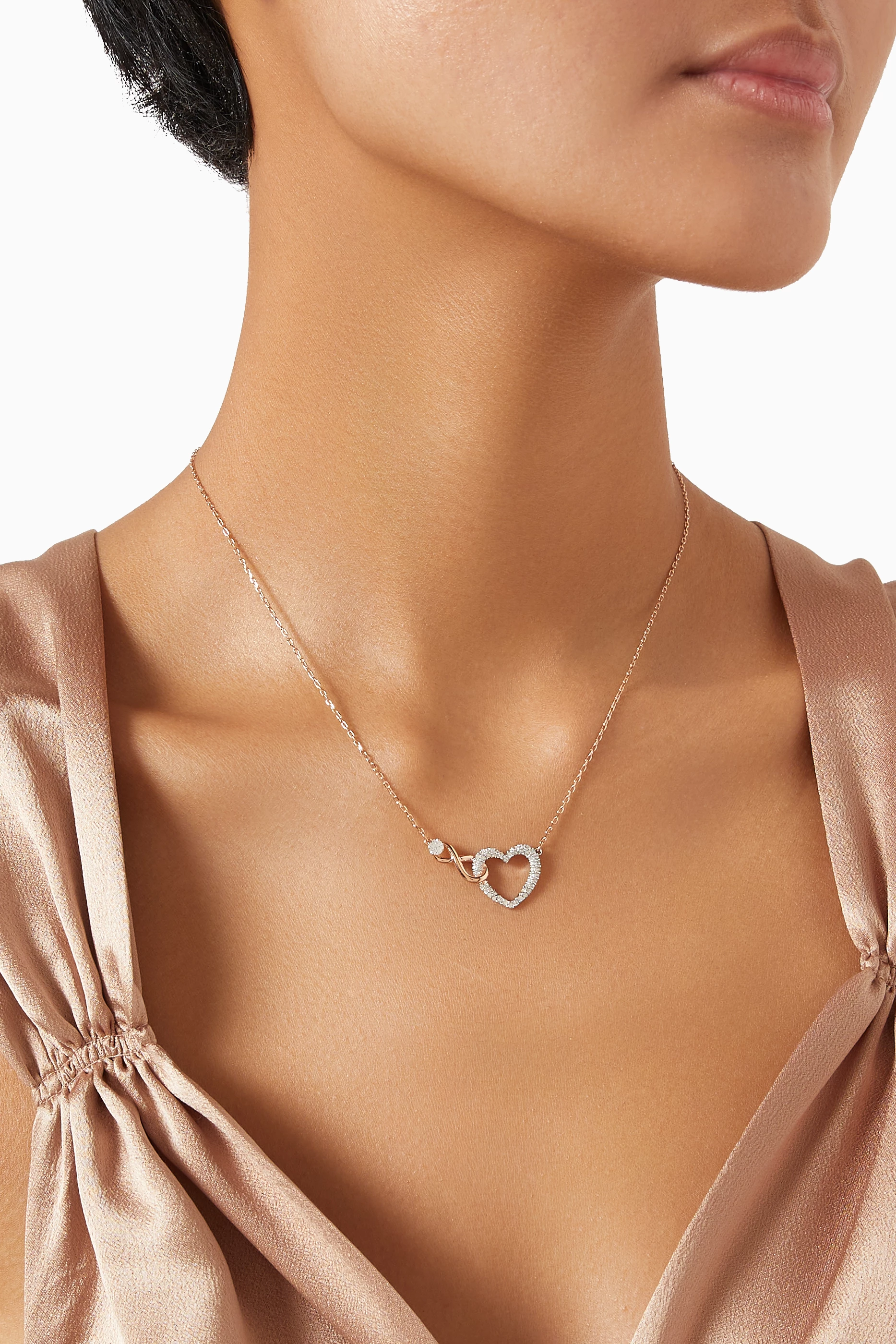 Buy Swarovski Gold Infinity Heart Necklace in Rose Gold-tone Metal