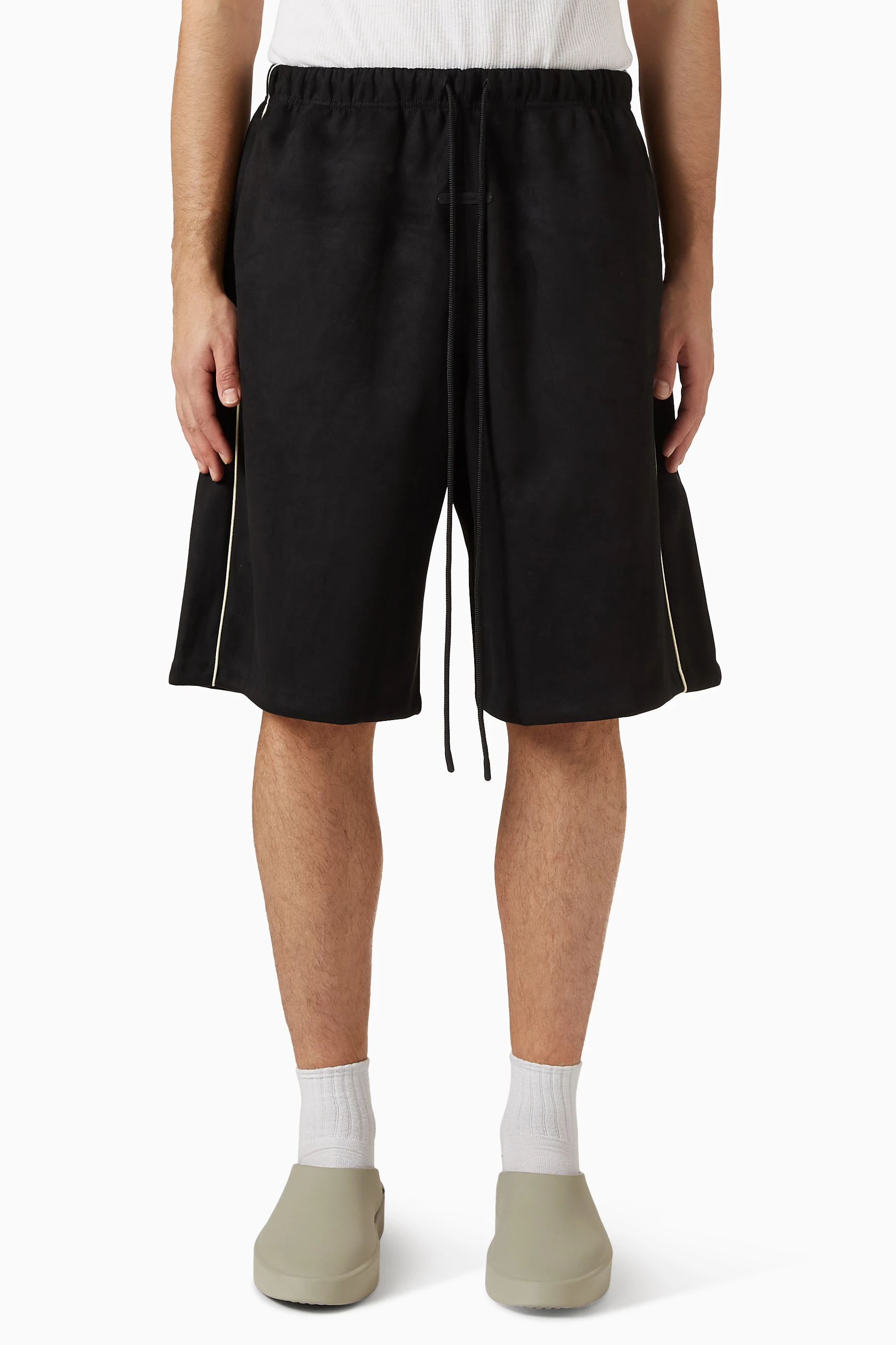 Buy Fear of God Essentials Black Signature Relaxed Shorts in Suede