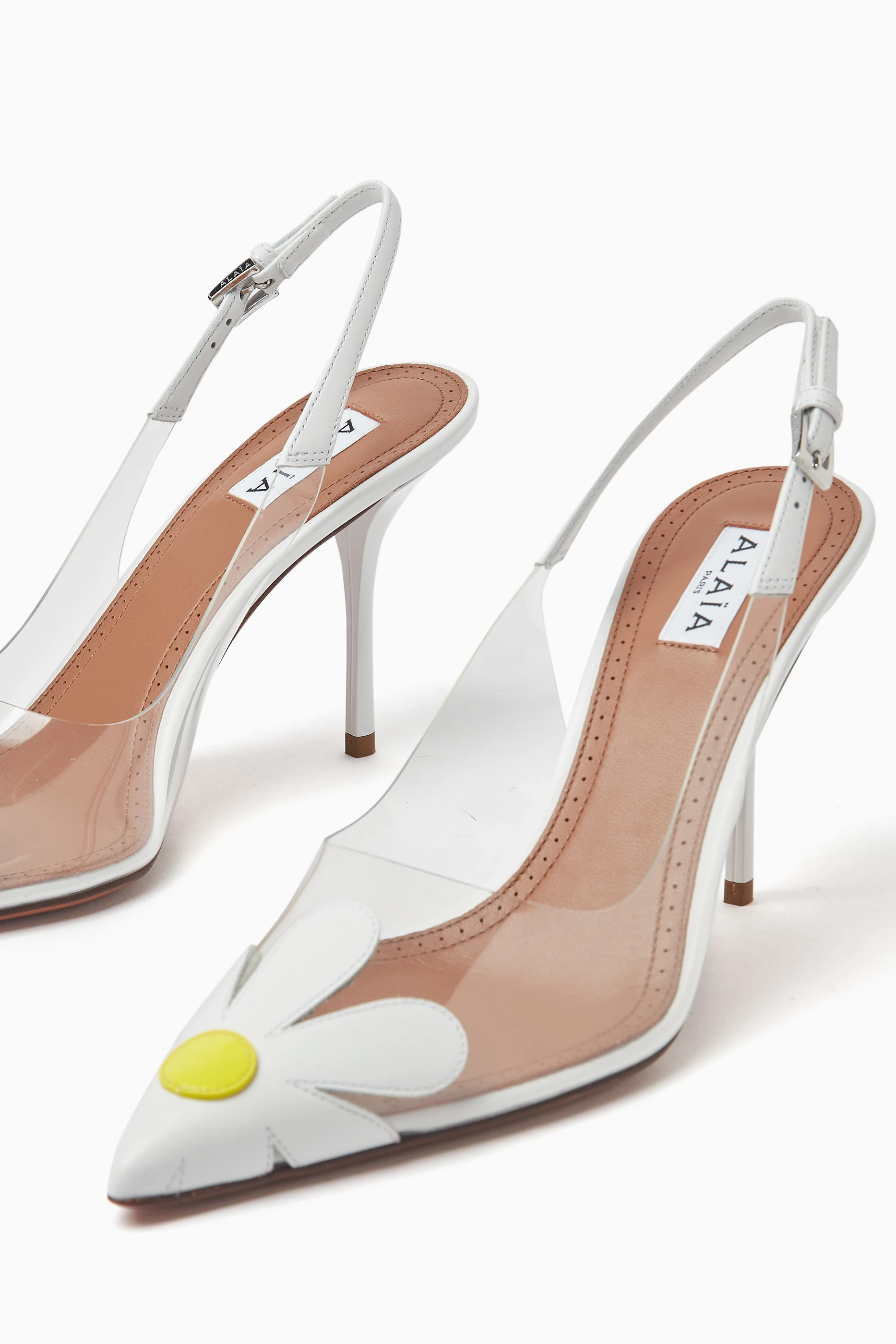 Buy Alaïa White Bloom Slingback 90 Pumps in Nappa Leather For
