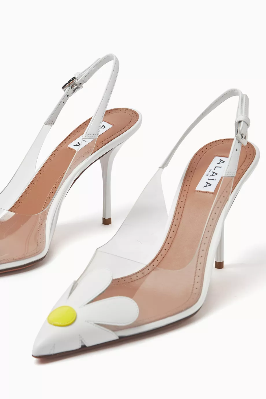 Buy Alaïa White Bloom Slingback 90 Pumps in Nappa Leather For